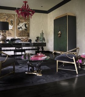 Office | luxury home office in art deco style with Divine armoire for storage, cosy gold office chair, glass center table, dark rug, and wood flooring