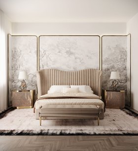 Bedroom | bedding area in cosy neutral style with Kelly curvy velvet bed, Poem bedside table for storage, Gem table lamp, Ignite bench, nature inspired wallpaper, rug, and wood flooring