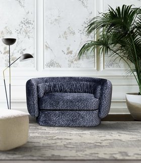 Living Room | spring/summer reading corner in cosy elegant style with Deb curvy navy blue loveseat, dark floor lamp, and vase