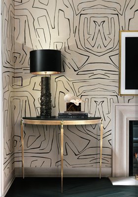 Living Room | elegant corner with Ruchê dark table lamp in retro style, Lune wood console table, and black and white wallpaper
