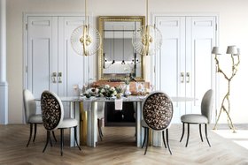 Dining Room | spring/summer dining set in art deco style with Merveille animal print dining chair, Paris white marble dining table, Roxy gold chandelier, wall mirror, exquisite floor lamp, stove, and wood flooring