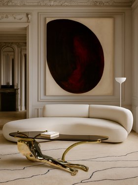 Living Room | white paint reading corner in quiet luxury style with Tabu gold and glass center table, curvy sofa, floor lamp, rug, and wall art