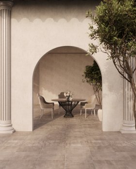 Outdoors | outdoor dining area with Allure dark dining table, Anastasia cosy grey dining chair, vase, arcade, and marble flooring