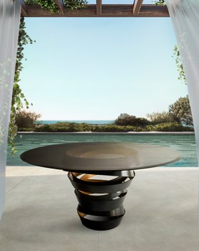 Outdoors | outdoor pool area with Intuition smoked glass and dark metal table and stone flooring
