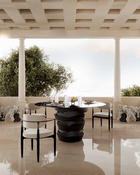 Outdoor | balcony dining area in black and white tones with Intuition smoked glass and dark bronze dining table, Nahéma chair, marble flooring, vase, and some greenery