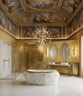 Bathroom | yellow and gold paint bathroom in modern classic style with Diamond white marble bathtub, Mecca washbasin, Outburst chandelier, Veneto rococo wall mirror, Cay wall lamp, shower, ceiling wallpaper, and marble flooring