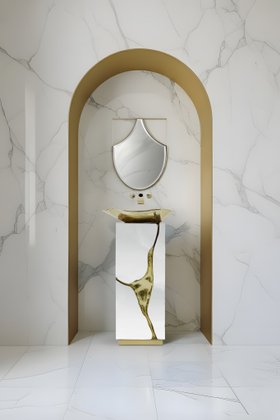 Bathroom | white marble bathroom with Lapiaz freestanding, gold vessel sink, and Koi curvy wall mirror