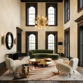 Living Room | autumn/winter reading corner in mid century modern style with Powel deep green curvy sofa, Marco retro white armchair, Fortuna gold center table, Outburst chandelier, Agatha neutral rug, Miles floor lamp, Belize mirror, and wood flooring