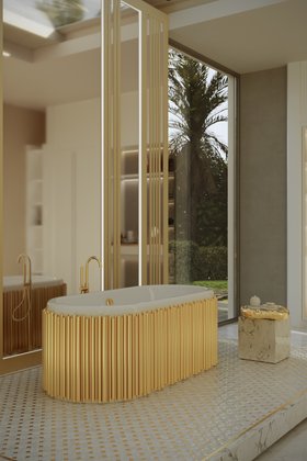 Bathroom | marble bathroom in gold details with Symphony bathtub, Stonehenge side table, wall mirror, and marble surface