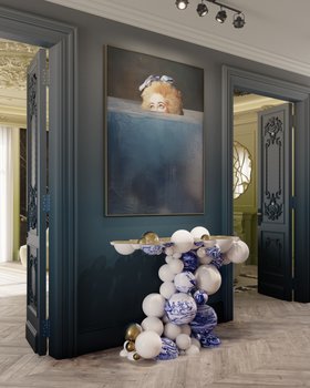 Entryway | deep blue paint hallway in modern classic style with Newton white console in portuguese tile, wall art, and brown wood flooring