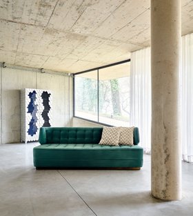 Living Room | modern classic reading corner with the turquoise green George sofa, Oporto exquisite cabinet for storage, cushion, curtain, and stone flooring