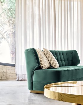 Living Room | modern classic reading corner with the turquoise green George sofa in curvy style, cushion, and curtain
