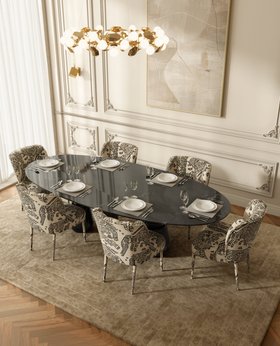 Dining Room | cosy elegant dining area in modern classic style with Dalyan black and white dining chair, Pietra dark marble dining table, Hera gold suspension lamp, White Garden neutral rug, Cubic sconces wall lamp, rococo wall decor, and wood flooring