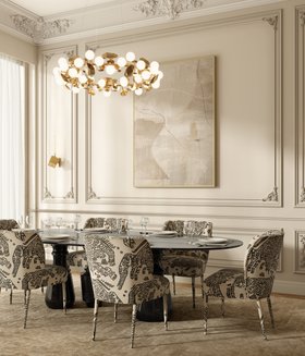 Dining Room | cosy elegant dining area in modern classic style with Dalyan black and white dining chair, Pietra dark marble dining table, Hera gold suspension lamp, White Garden neutral rug, Cubic sconces wall lamp, and rococo wall decor