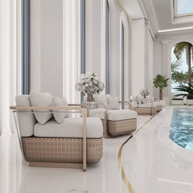 Indoor Pools | marble indoor pool area with Hampton wood armchair, cushion, and vase