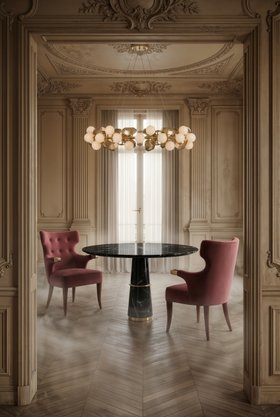 Dining Room | beige paint dining area in rococo style with Agra dark marble dining table, Sika curvy pink armchair, Hera art deco suspension lamp, curtain, and brown wood flooring