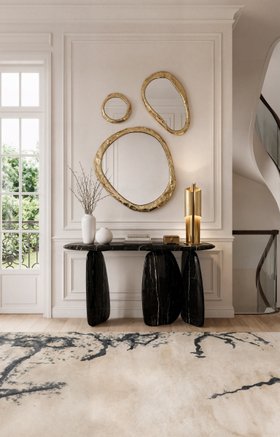Entryway | luxury hallway in modern classic style with Ardara dark marble console table, Halo set of gold wall mirrors, Cyrus table lamp, Gobi rug, and wood flooring