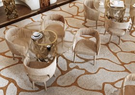 Dining Room | cosy neutral dining area in modern classic style with Stola curvy velvet dining chair, Koi glass dining table, and Cell rug