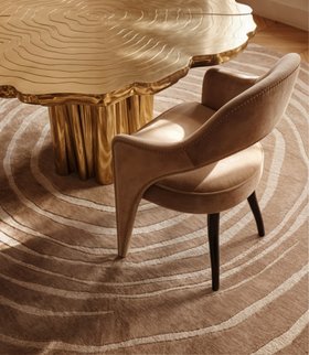 Dining Room | cosy neutral dining area in modern classic style with Tellus curvy velvet dining chair, Eye beige rug, and Fortuna gold dining table
