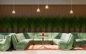 Living Room | spring/summer reading corner in retro style with Sophia cosy green sofa, Dolly dark marble and gold coffee table, Hanna white pendant lamp, terracotta rug, and some greenery
