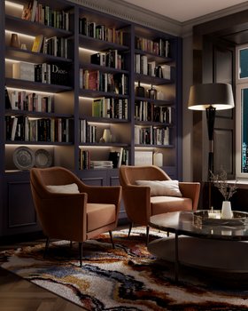 Library | cosy neutral reading corner in retro style with Charlotte orange armchair, Craig dark marble center table, Miles floor lamp, La Land rug, bookcase for storage, and cushion