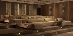Cinema at Home | cosy neutral living room in mid-century modern style with Qube grey modular sofa, Hoppman brown wood side table, Lautner cabinet for storage, Neil wall lamp, mantle, cushion, and staircase