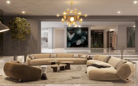 Living Room | cosy neutral reading corner in mid-century modern style with Elo white modular sofa, Elo forest green armchair, Botti gold chandelier, Philip brown wood center table, Vinicius marble side table, Agatha rug, wall art, and vase