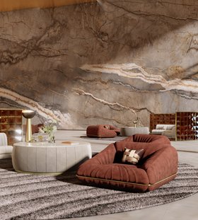 Living Room | cosy neutral reading corner in mid-century modern style with Xenon terracotta armchair, Florence grey center table, Mirage floor lamp, Kara rug, cushion, and stone wall