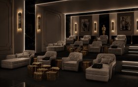 Cinema at Home | dark paint home cinema in luxury modern style with Charla cosy single sofa, Eden gold center table series, Brubeck retro wall lamp, mantle, and cushion