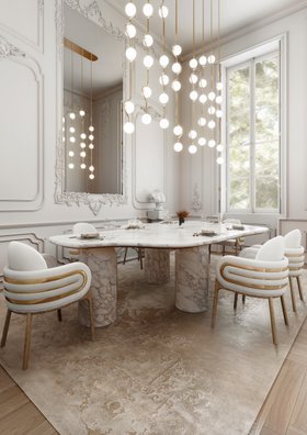 Dining Room | autumn/winter dining area in art deco style with Dunaway curvy gold dining chair, Marble dining table, Branch suspension lamp, Poseidon neutral rug, wall mirror, boiserie, and wood flooring