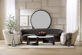 Arteriors, Pira Mirror, £7,804, Delfino Swivel Chair £4,105, Turner Sofa, £10,738 Lorena Coffee Table, £4,506 Renzo Centerpiece £1,835