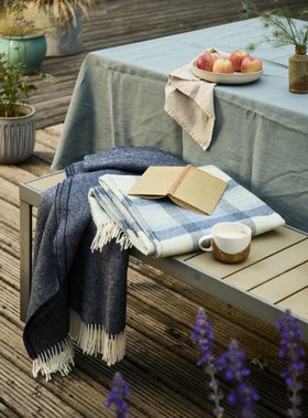 MOON, Herringbone Navy Merino Wool Throw, £120, Skye Blue Pure Wool Throw, £95