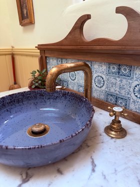 Swadling Brassware Invincible Deck Mounted Basin Mixer with Living Brass finish Curved Spout and Crosshead Taps with patina development 3