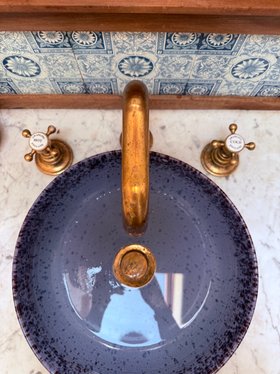 Swadling Brassware Invincible Deck Mounted Basin Mixer with Living Brass finish Curved Spout and Crosshead Taps with patina development 2