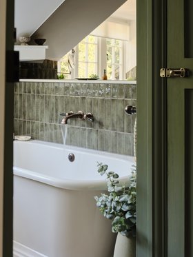 Swadling Invincible Wall Mounted Bath Mixer with Black Levers and Aged Brass finish