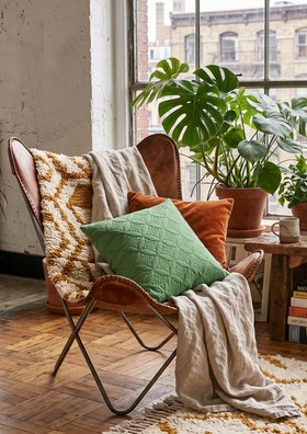 Moss Green Quilted Cushion Cover in Boho Living Room