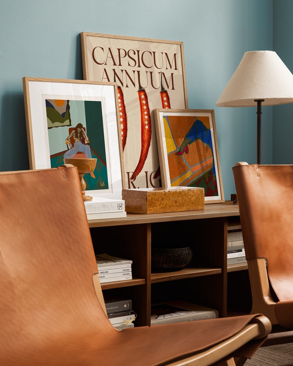 Stack several prints from the collection together to create a cohesive look