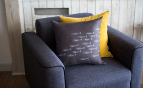 Linen Slate Grey Fish Shoal Cushion from the Quayside Collection by Helen Round