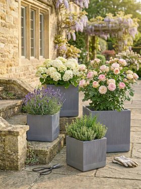SET OF 4 GREY RIB PLANTERS