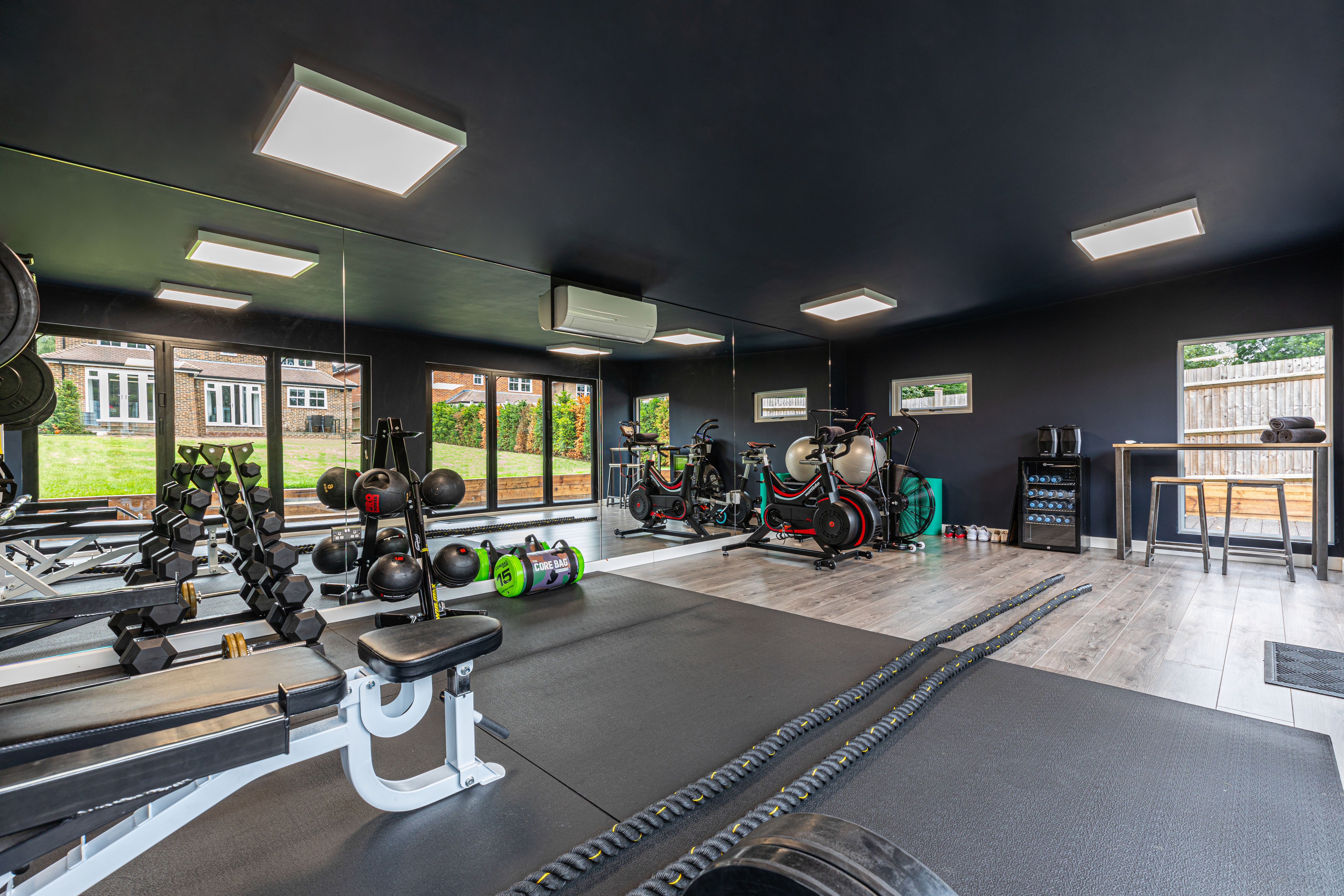 These home gyms can cost as much as the homes themselves