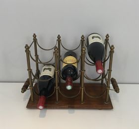 NEOCLASSICAL STYLE BRASS AND WOOD BOTTLES RACK