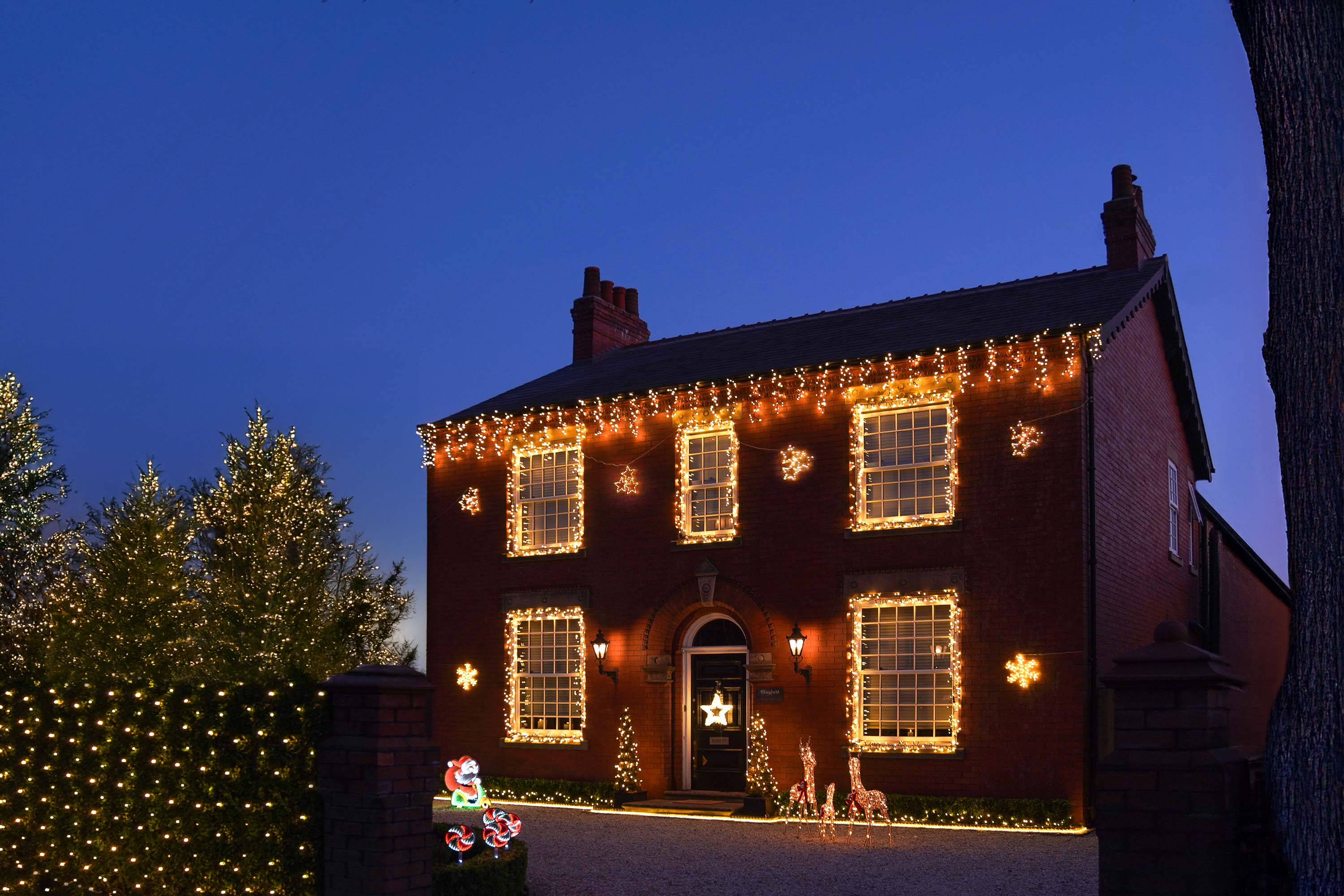 Warm White Christmas House 2025