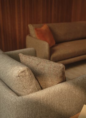 ercol Aosta Large Sofa and Snuggler in an Oak Clear Matt Finish and Rust Fabric