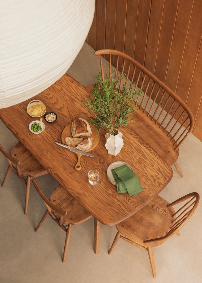 ercol Originals Plank Table, Heritage Loveseat and Stacking chairs all in a Vintage Ash finish