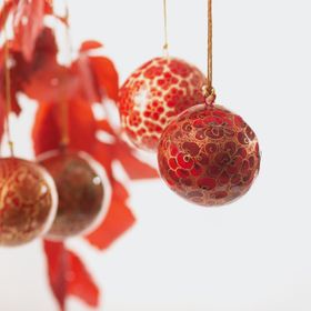 Six Medium Fairtrade Christmas Baubles in Red and Gold