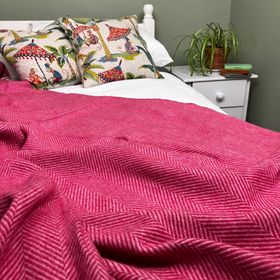 Cerise pink herringbone merino wool throw