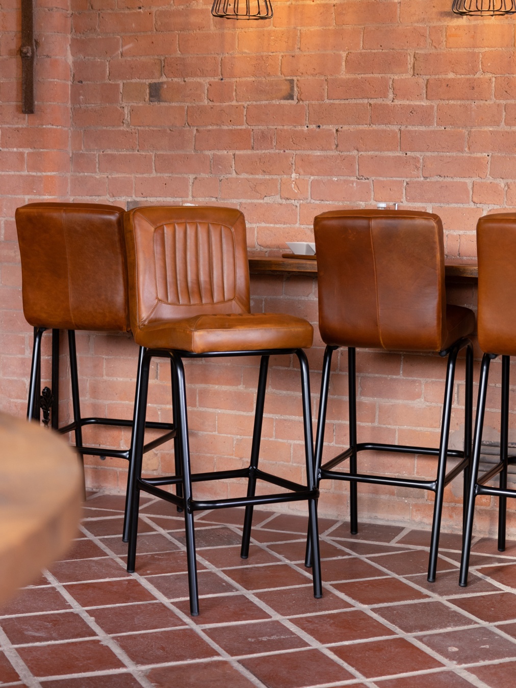 Jenson Distressed Leather Bar Stools - Tan