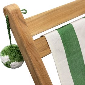 Green Pom Pom Hanging On Polevault Deckchair Hires