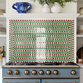 Cottage style green and red ceramic backsplash