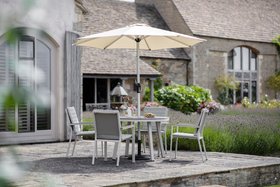 Bramblecrest Zurich 110cm Round Tree Free Table With 4 Chairs, Parasol & Base   Mocha